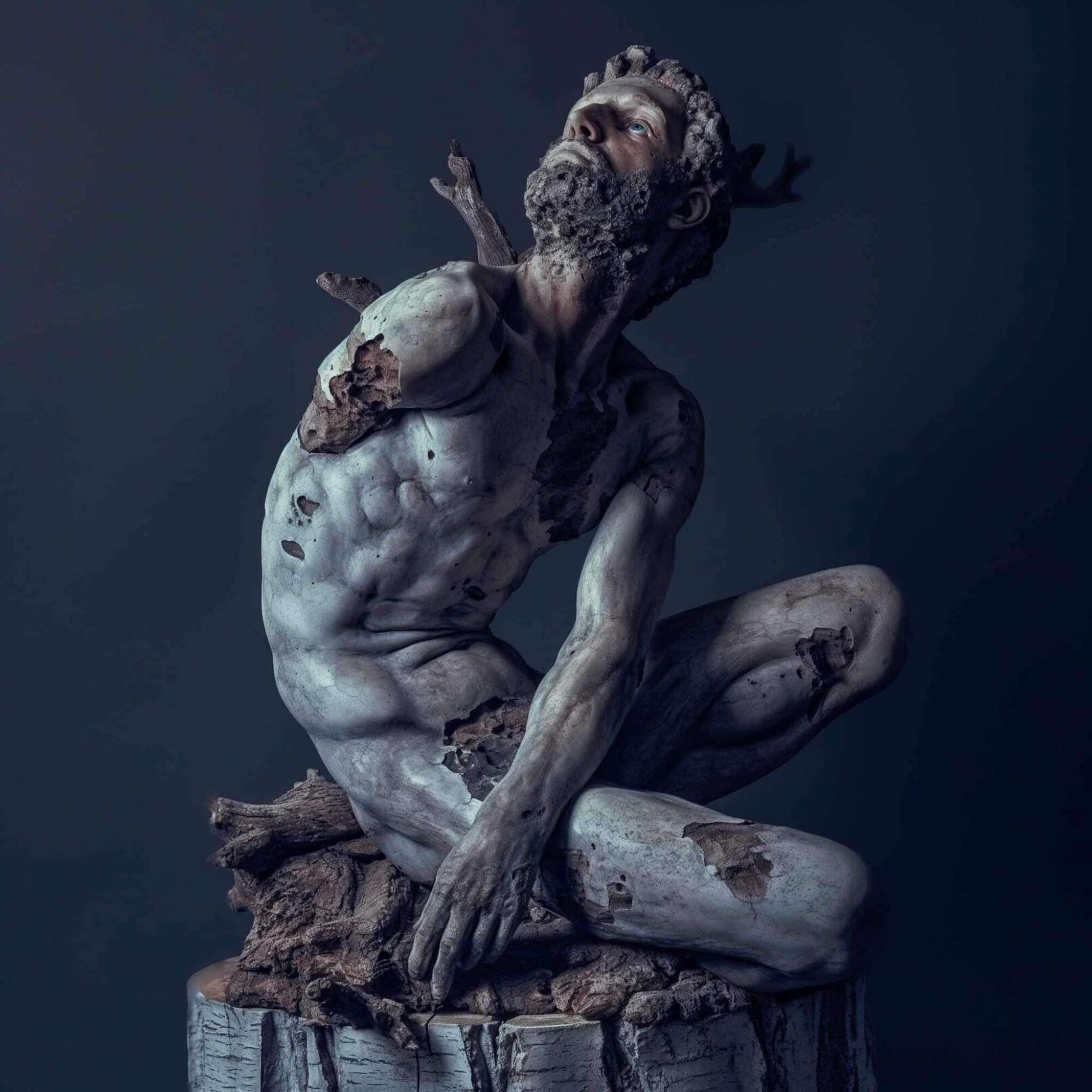 sculpture of a kneeing person watching above work by Dimosthenis Gallis, Trauma, 2024